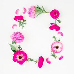 Floral frame of pink flowers on white background. Floral composition. Flat lay, top view.