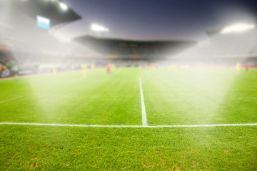 Obraz premium evening stadium arena soccer field defocused background