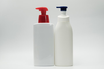 Skincare bottles on white background