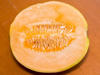 Cantaloupe, cut in half on the table