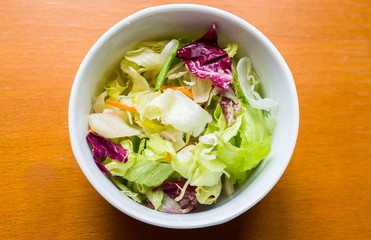 Delicious salad on the table top view