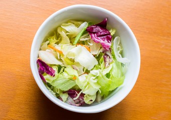 Delicious salad on the table top view
