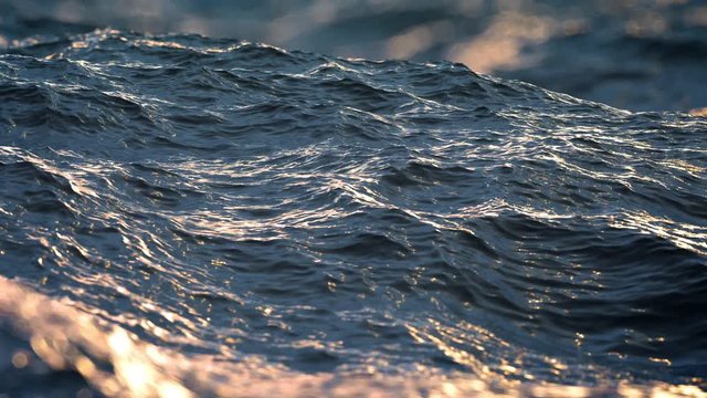 Slow motion close up of  disturbed ocean water surface