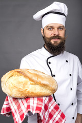 Chef holding fresh bread