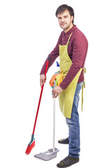 Full length portrait of a man sweeping the floor