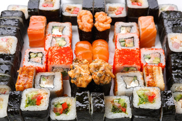 Set of sushi, maki and rolls isolated on white background