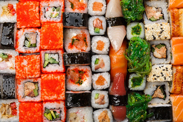 Set of sushi, maki and rolls background