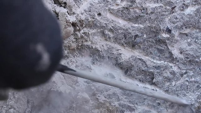 Drilling stone wall