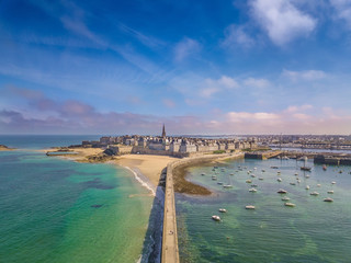 Drone view of the beautiful city of Privateers on sunset- Saint Malo in Brittany, France - obrazy, fototapety, plakaty
