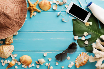 Vacation background on blue wood, top view with copy space