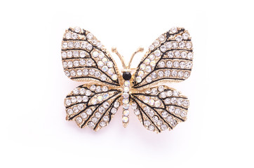 Obraz na płótnie Canvas Brooch golden butterfly with diamonds isolated on white