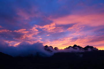 Silhouette, Beautiful Colorful Sunset Over Mountain Ranges.