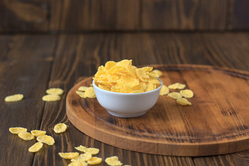 Corn flakes in bowl - cereal breakfast.