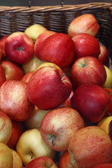 Fresh red apples on retail market close up