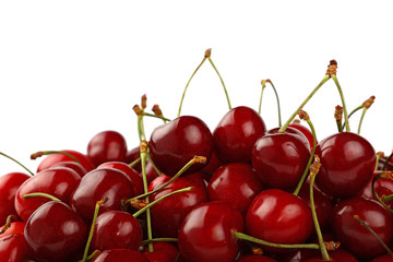 Obraz na płótnie Canvas Heap of red sweet cherry isolated on white