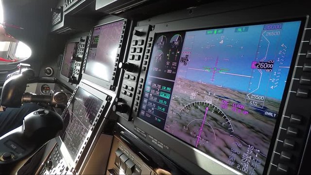 Private airplane cockpit - closeup of modern avionics (screen) 