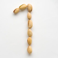 Numeral pistachios white background