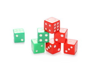 Red and green gambling dice isolated on white background