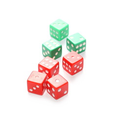 Red and green gambling dice isolated on white background