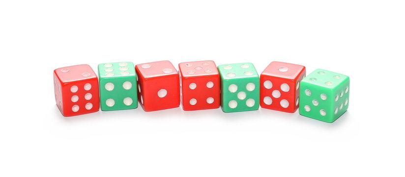 Red and green gambling dice isolated on white background