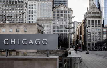 Old Chicago city buildings viewed from Chicago Art Museum, with CHICAGO sign in foreground
