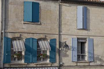 Traditional window and shutters at the old town in Arles in the south of France