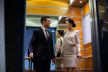 business team with travel bags in hotel elevator © Syda Productions