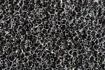 Macro photo, texture of black water filter, for background.