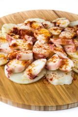 Pulpo a la gallega. Galician octopus isolated on white background. Typical spanish food

