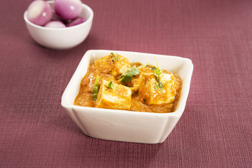 Cheese Cooked in a Creamy Sauce