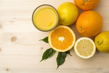 Fresh citrus fruits on a old wooden table