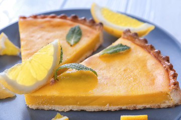 Plate with delicious lemon pie, closeup