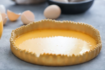 Uncooked lemon pie on table, closeup