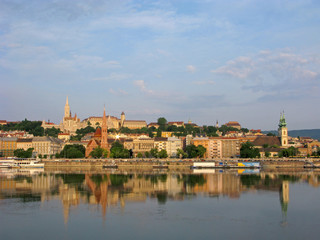 Hungary. Panorama of Budapest city, Buda side. Fishermans bastion, Danube river, St. Matthias church, Calvinist church and church of St. Anna. Sunny morning.