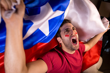 Chilean Guy Celebrating with Chile Flag
