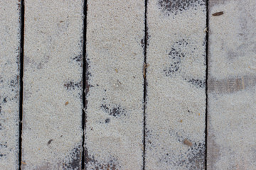 Wooden planks in the sand