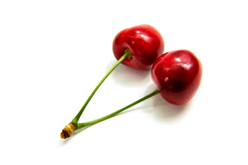 Heart shaped cherry berries isolated on white background cutout