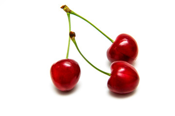 Heart shaped cherry berries isolated on white background cutout