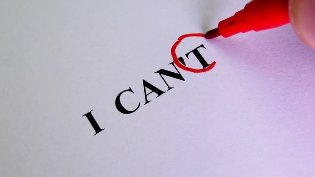 Motivation Concept For Business. Remove The Word I Can't To Read I Can Concept For Self Belief, Positive Attitude And Motivation. The Hand Crosses out the Part of the Text on the Paper