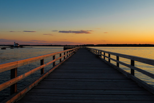 Walkway of a bridge at sunset  andamanbangkokbaybeachbridgecolorfuldaydramaticduskharborhorizonislandlagoonlakelandscapemainemaldivesmarinamorningmotorboatnaturenew hampshirenightoceanoverparadisepier