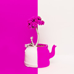 Creative Flower in a teapot. Minimal art design