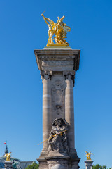     Paris, pont Alexandre III, golden statue on the bridge 
