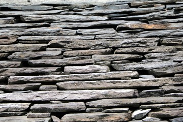 Old house roof with stones at Lake Orta, Piedmont Italy
