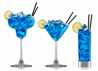 fresh fruit alcohol cocktail or mocktail in classic glass with blue beverage and ice cubes isolated on white background