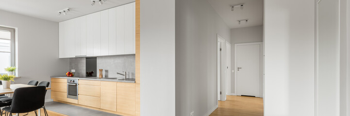 Fototapeta na wymiar White loft apartment with kitchen