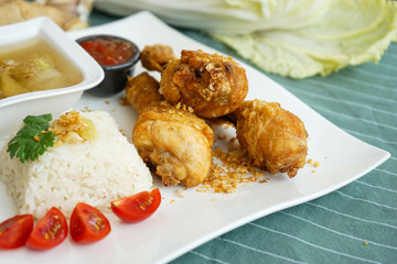 Deep fried chicken drumstick with rice cooked in chicken broth, Home made Thai food, Rice Steamed With Chicken Soup