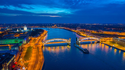 Obraz premium St. Petersburg. The Bridge of Peter the Great. Bolsheokhtinsky bridge at night. Diluted bridges SPb .