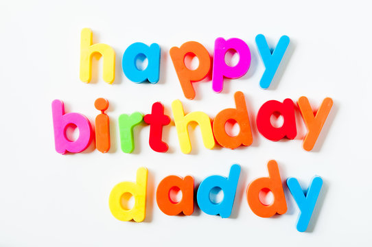 Fridge magnets magnetic letters spelling out "happy birthday daddy"