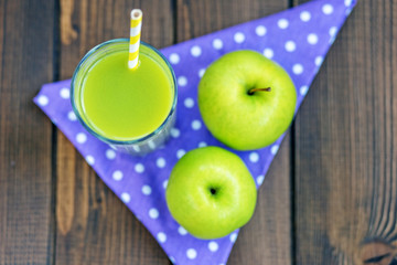 Apple juice in a glass. Copy space. Flat lay. The concept is healthy food, vegan, diet, weight loss.