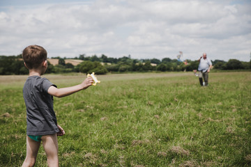 Son flying kite